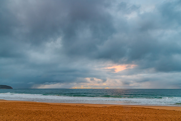 Grey overcast and drizzly sunrise seascape
