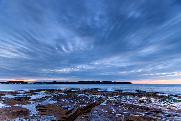 Cloudy Dawn Seascape from Rock Shelf