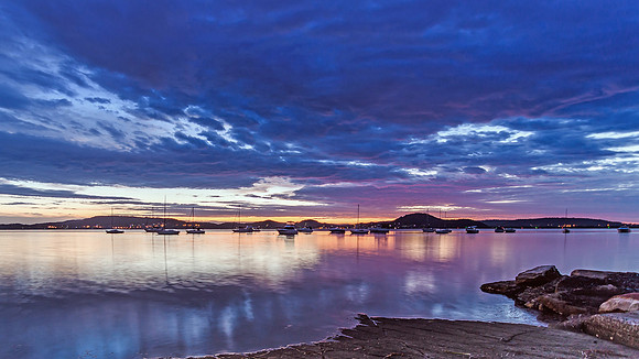 Dawn Waterscape with boats on the Bay