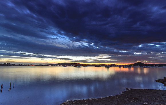 Dawn Waterscape with boats on the Bay