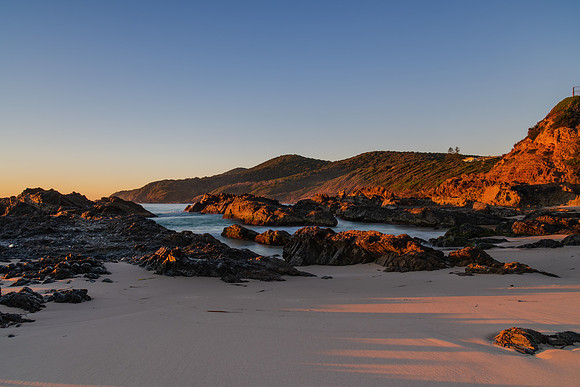 Sunrise seascape and a rocky beach