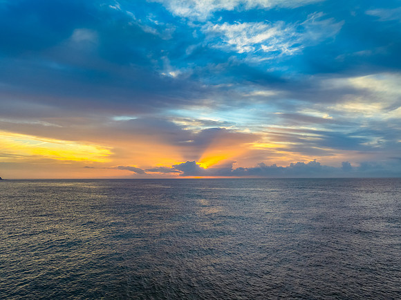Aerial Sunrise Seascape Shrouded in Fog and High Clouds
