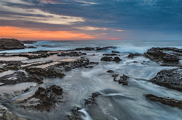 Sunrise Seascape and Rocky Headland