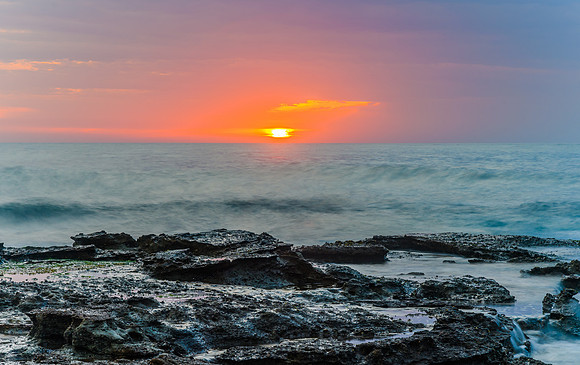 Sunrise Seascape and Rocky Headland