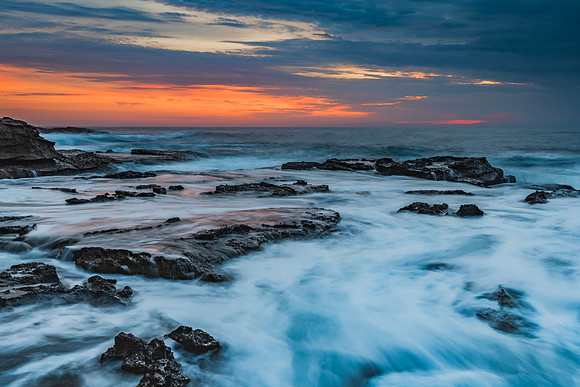 Sunrise Seascape and Rocky Headland