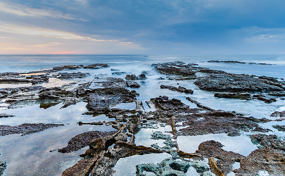 Sunrise Seascape and Rocky Headland