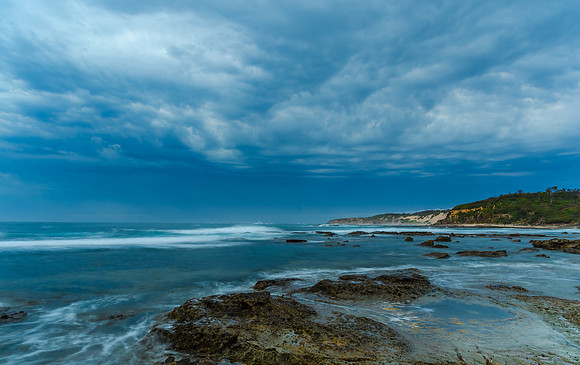Sunrise Seascape and Rocky Headland