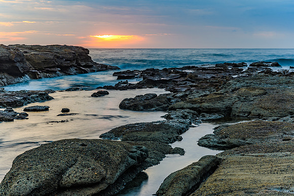 Sunrise Seascape and Rocky Headland