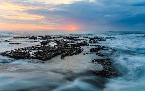 Sunrise Seascape and Rocky Headland