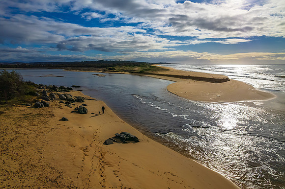 A cloud covered winters morning where the river meets the sea in
