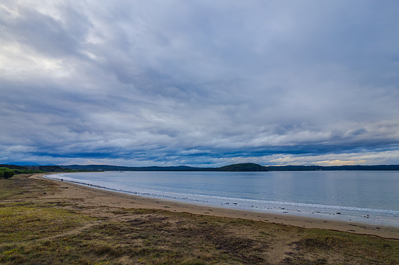 Rainy day sunset seascape at Corrigans Beach