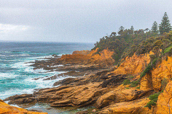 Overcast morning seascape with rocky headland at Bermagui