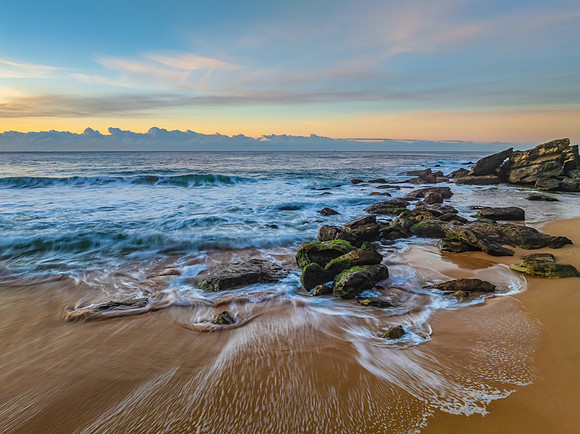 Sunrise seascape views with high cloud