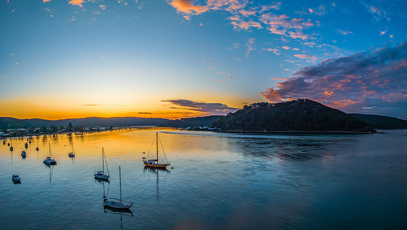 Sunrise views over the channel and bay with boats