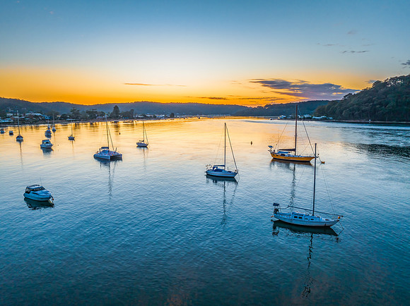 Sunrise views over the channel and bay with boats