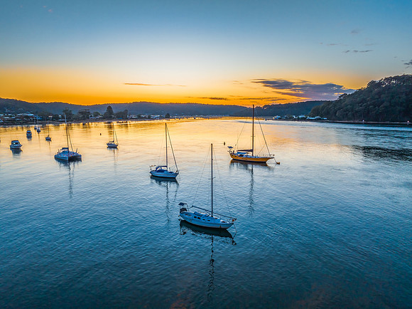 Sunrise views over the channel and bay with boats