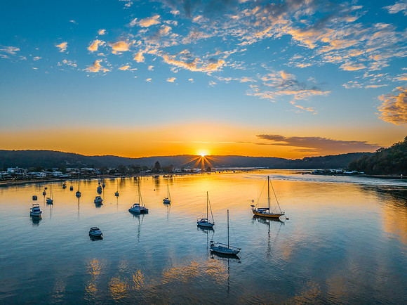 Sunrise views over the channel and bay with boats