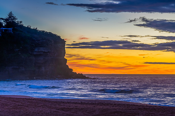 Sunrise at the Seaside with rain clouds