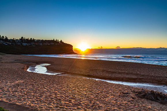 Sunrise by the sea shore