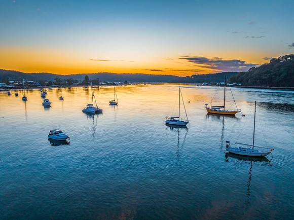 Sunrise views over the channel and bay with boats