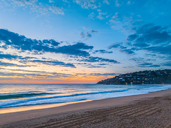 Sunrise at the seaside with clouds