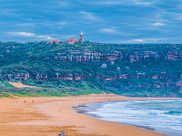 Sunrise at the seaside with Barrenjoey Headland in Palm Beach