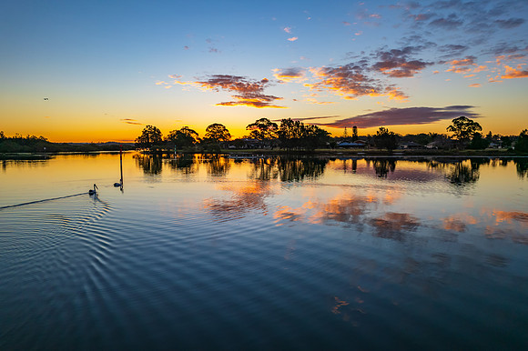 Ohmas Bay Sunset with Clouds and Reflections