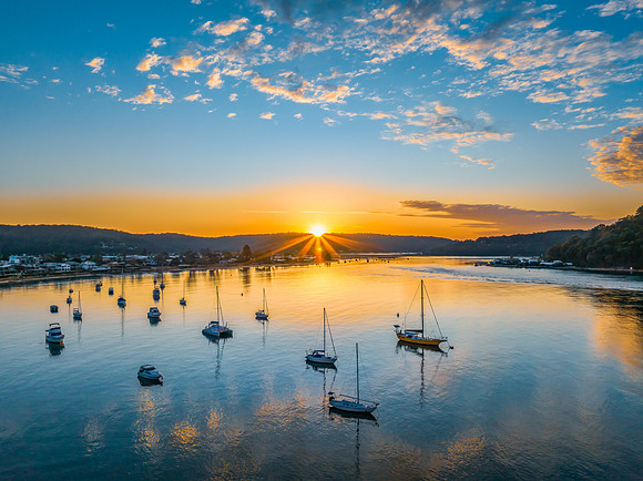 Sunrise views over the channel and bay with boats