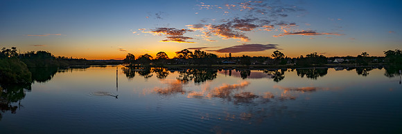 Panorama Bay Sunset with Clouds and Reflections