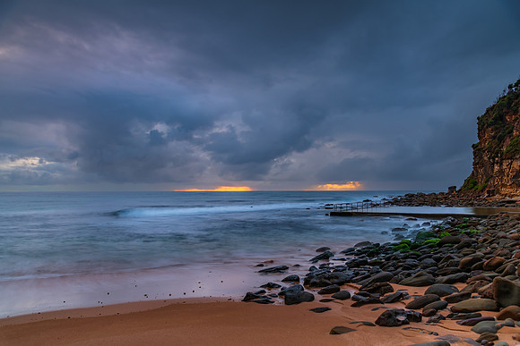 Wet weather sunrise seascape