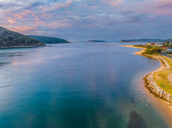 Sunrise views over the channel and bay with boats