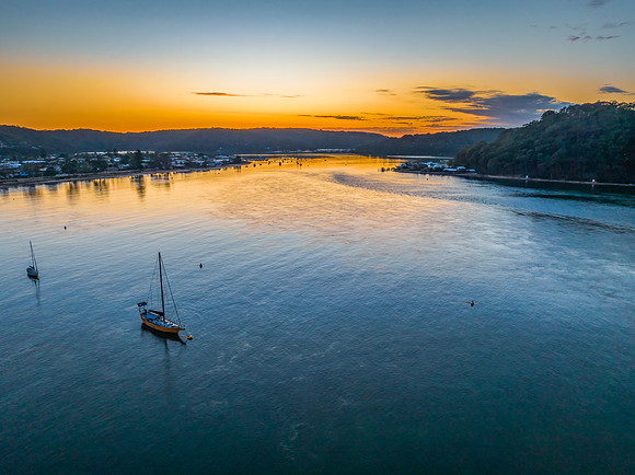 Sunrise views over the channel and bay with boats