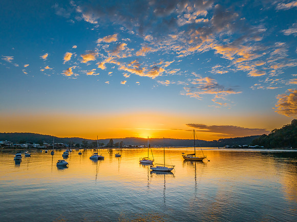 Sunrise views over the channel and bay with boats