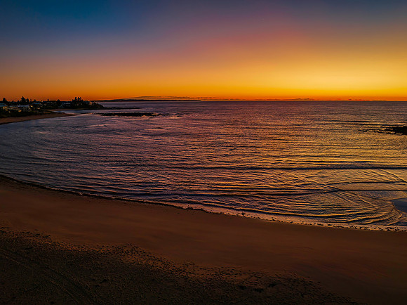 Aerial sunrise seascape with  clear skies