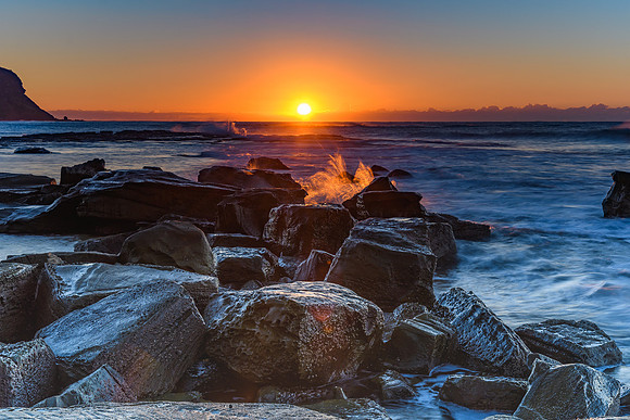 Sunrise and Rocky Sea Shore