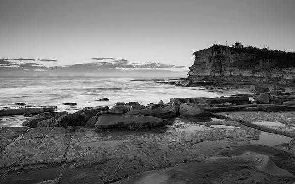 Black and White Early Morning Seascape with Headland