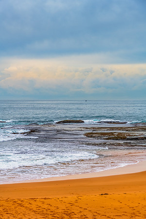 Cloud covered day at Mona Vale Beach