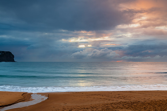 Wet weather sunrise seascape
