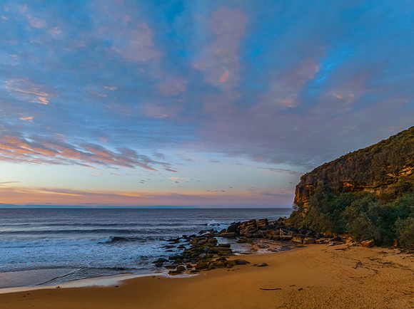 Winter seascape views over the beach with high and medium cloud