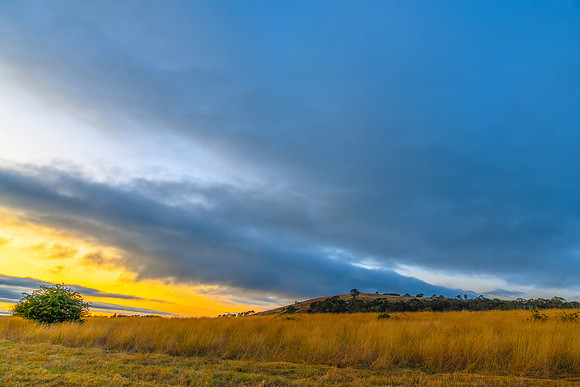Sunset views over rural farmland with clouds