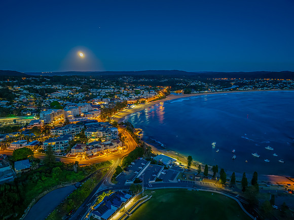 Reverse Sunrise with Full Moon and first light over Terrigal and