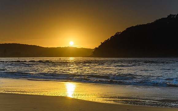 Shimmering Sunrise Seascape with Sun