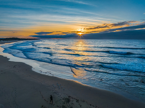 Sunrise seascape with waves
