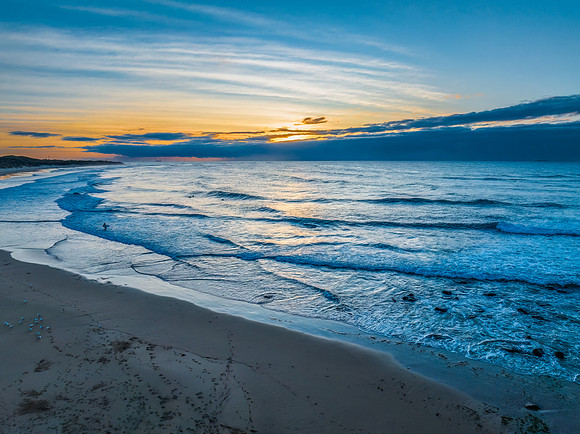 Sunrise seascape with waves