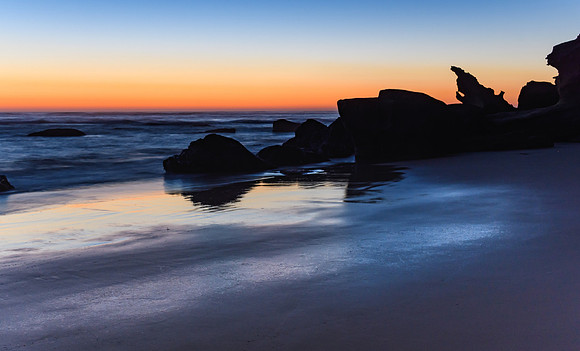 Silhouettes and Dawn at the Beach