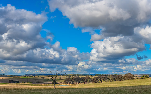 Clouds and a Winter sky over rural land
