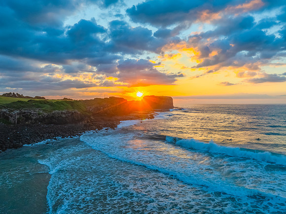Aerial sunrise views over Bombo Beach at Kiama