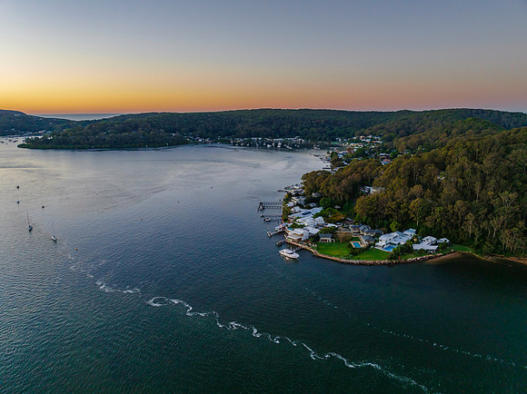 Aerial sunrise waterscape with clear skies