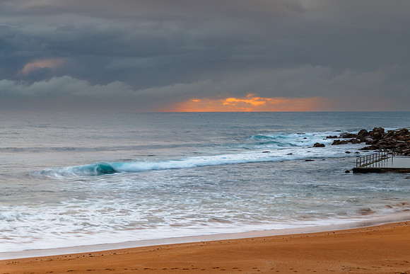 Wet weather sunrise seascape