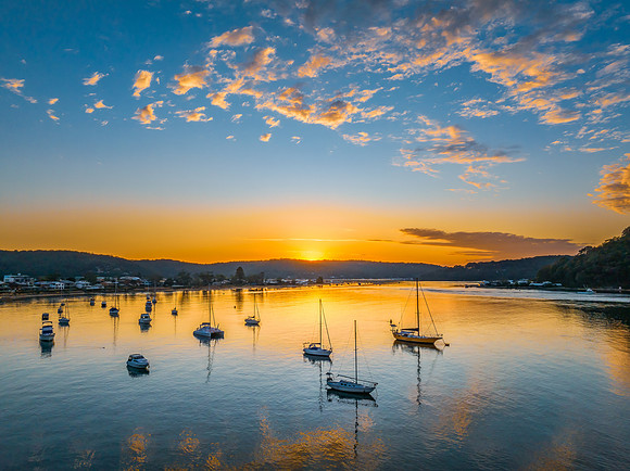 Sunrise views over the channel and bay with boats